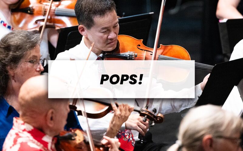 String section playing in a concert