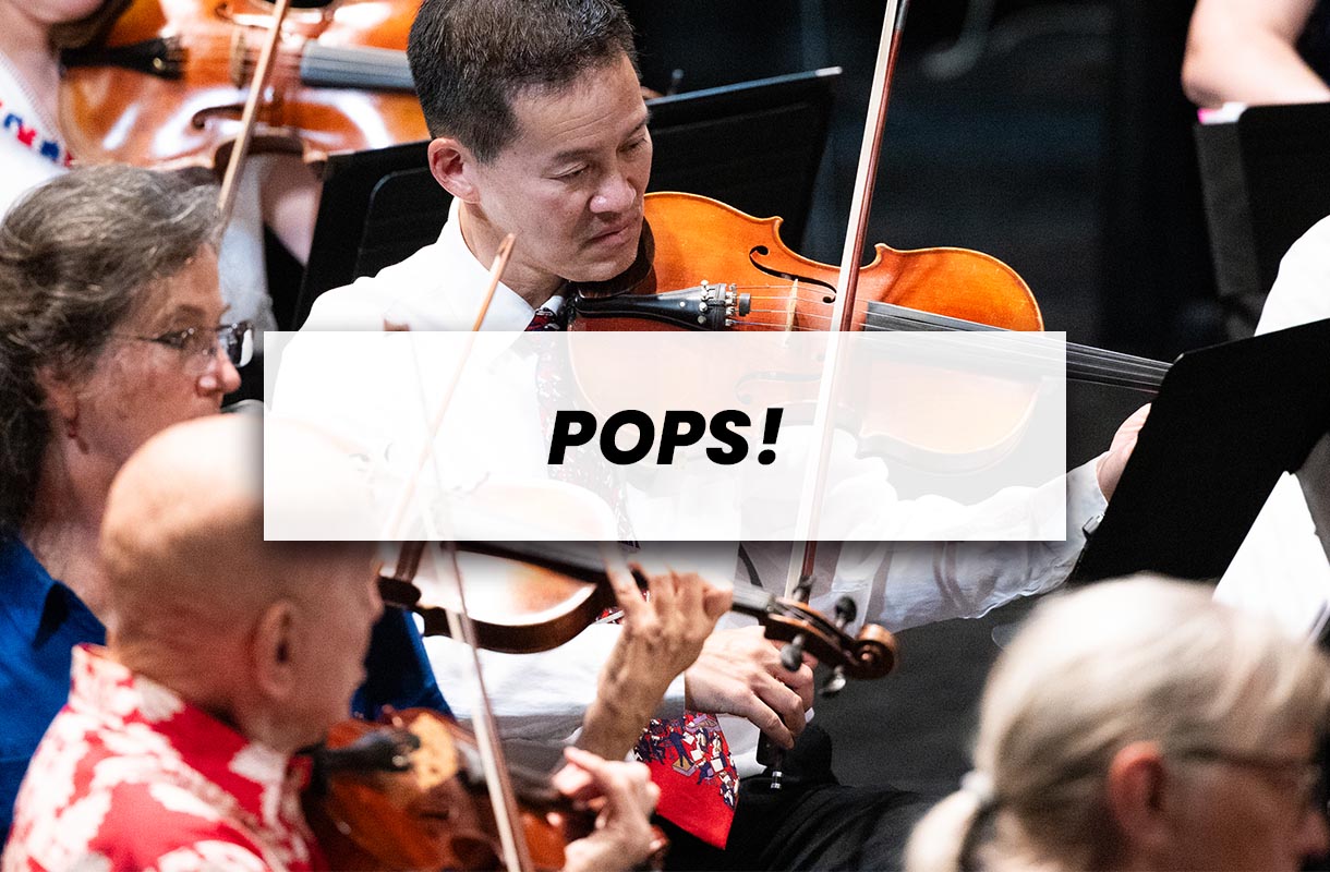 String section playing in a concert